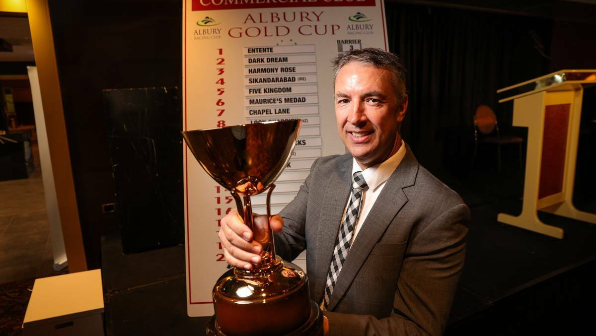 Steve Hetherton with the Albury Gold Cup. Picture: The Border Mail
