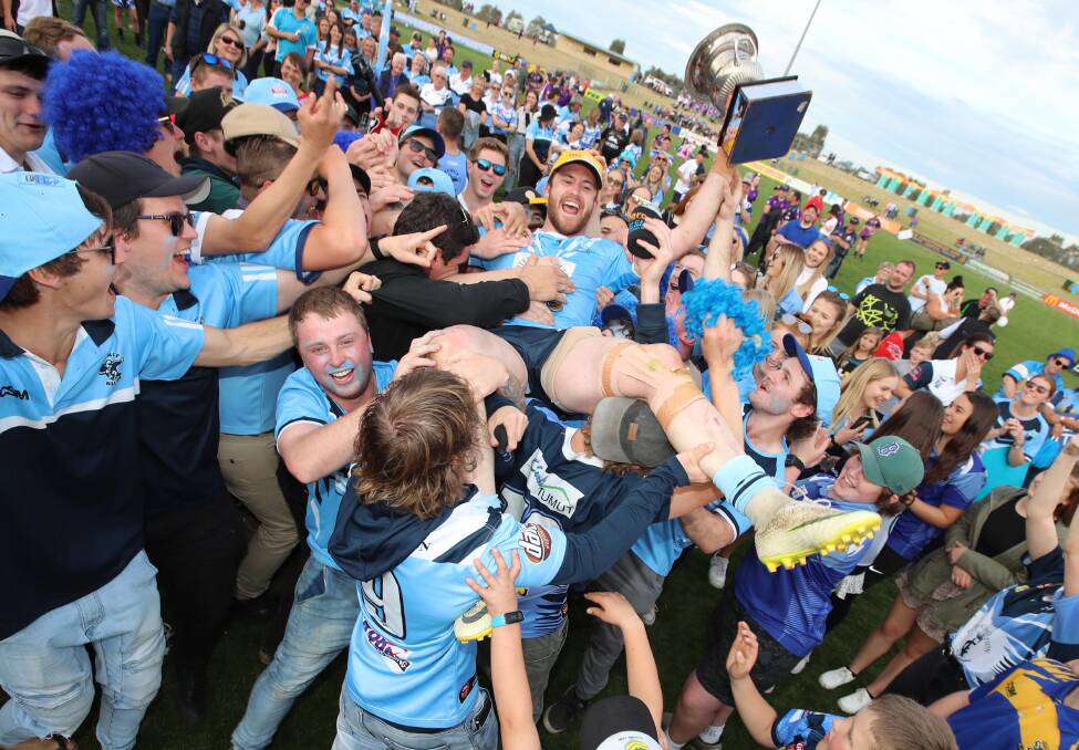 GOOD TIMES: New Tumut co-coach Lachlan Bristow enjoys the grand final celebrations. Picture: Les Smith
