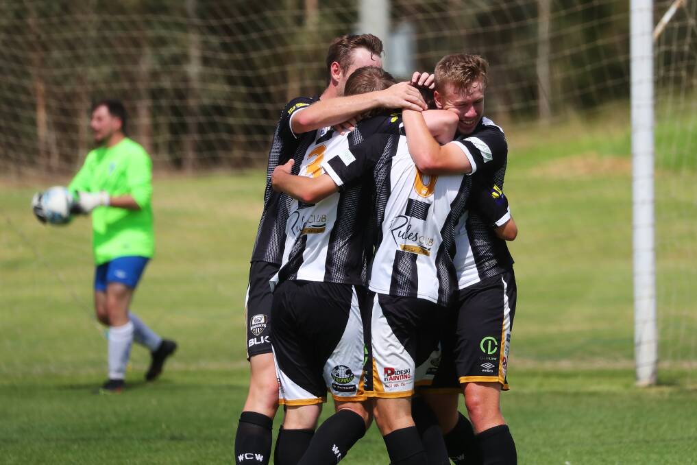 ON THE IMPROVE: Wagga City Wanderers celebrate a goal in their FFA Cup win against Majura FC in March. They enjoyed their first win of the NPL Two season last weekend.