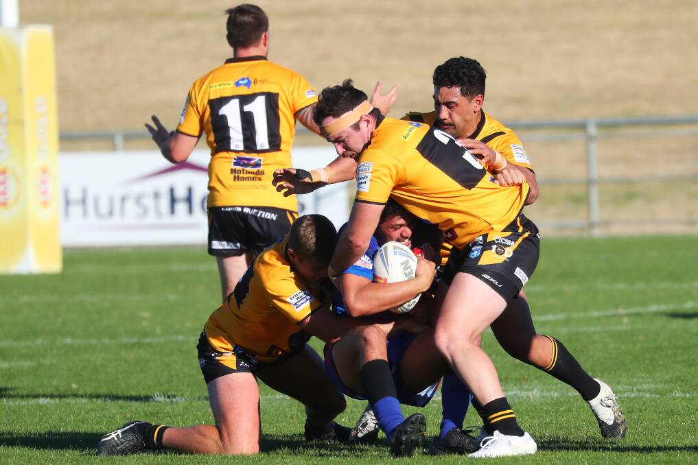 SWITCH: James Strickland, in action for Kangaroos this season, getting swamped by the Gundagai defence. Picture: Emma Hillier