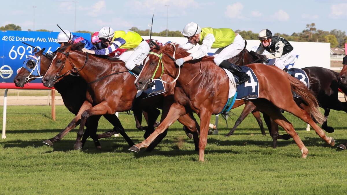 FOND MEMORY: Another One charging down the outside to win last year's SDRA Country Championships Qualifier (1400m) at Wagga. Picture: Les Smith