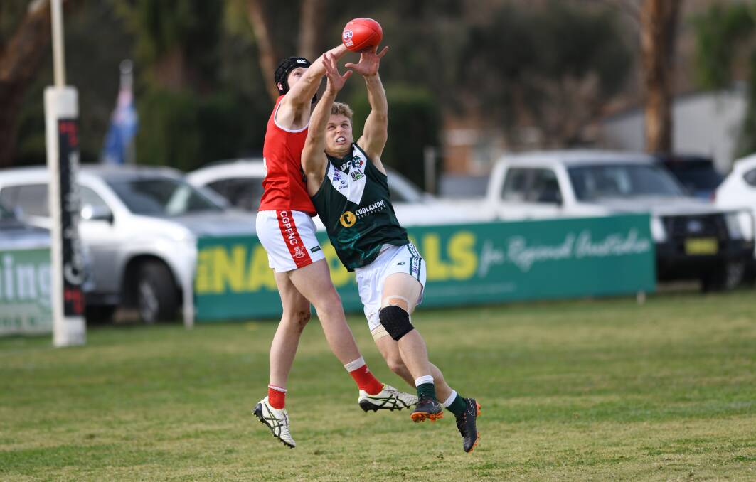 TARGET: Coolamon forward Jeremiah Maslin is spoiled by Collingullie-Glenfield Park's Harry Radley at Crossroads Oval on Saturday.