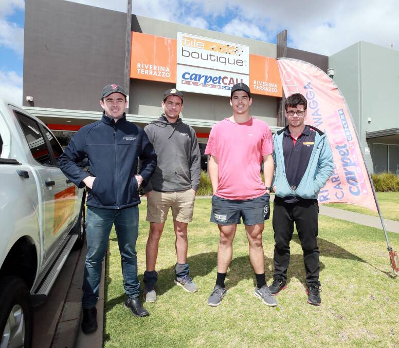 ALL IN THE FAMILY: James, Daniel, Matt and Nick Kennedy at the family business on Thursday. Picture: Les Smith