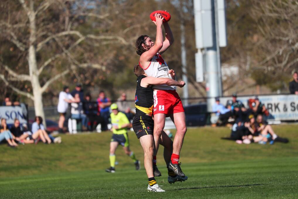 ON FIRE: Griffith full-forward Lucas Conlan takes a mark against Wagga Tigers in the qualifying final at Narrandera Sportsground on Saturday. Picture: Emma Hillier
