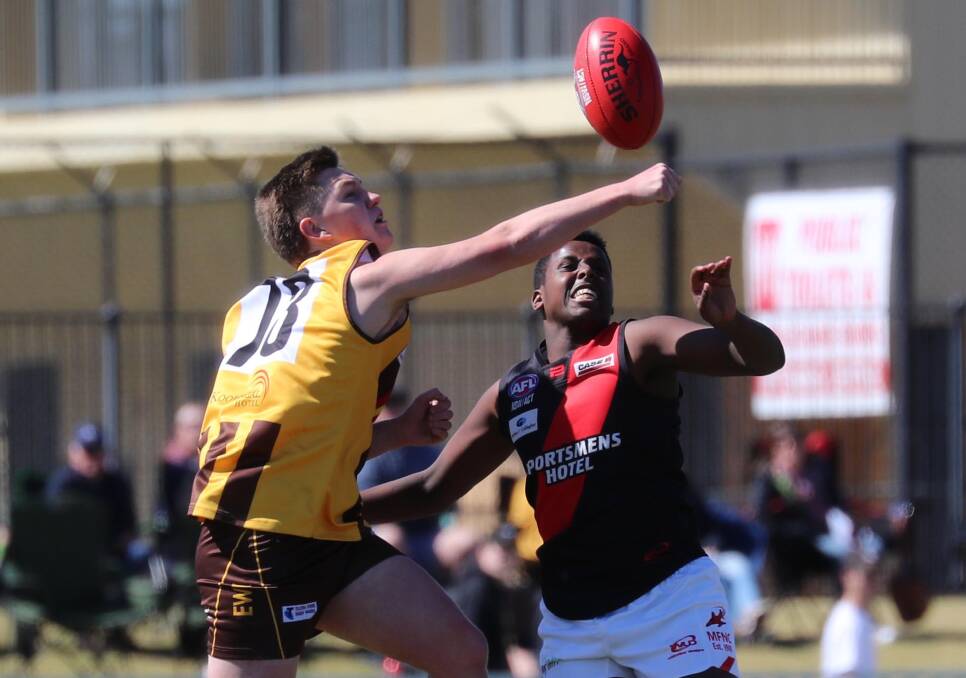 BLOW: East Wagga-Kooringal's James Day and Marrar's Abdallah Farah battle it out in the under 17.5 grand final back in 2019. Picture: Les Smith