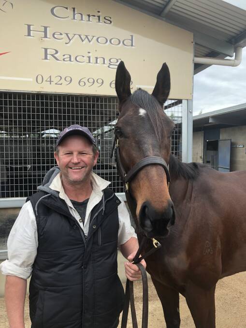 WINNERS ARE GRINNERS: Wagga trainer Chris Heywood with Monsoon Charlie, who won the Wagga Stayers Series. Picture: Matt Malone