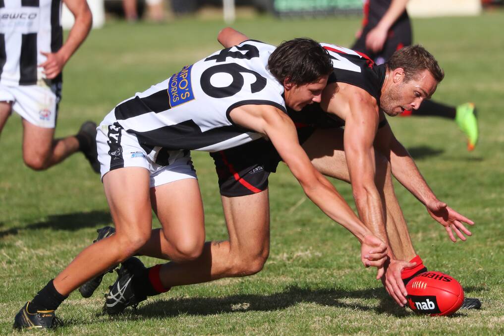 FIT TO PLAY: Marrar forward James Lawton battles it out with Cody Cool early in the season. Lawton will line-up against EWK on Saturday. Picture: Emma Hillier