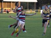 DRIVING FORWARD: Kildare Catholic College's Pat Ryan looks to send his team forward in the Carroll Cup game against Kooringal High School at Gumly Oval on Monday. Picture: Madeline Begley