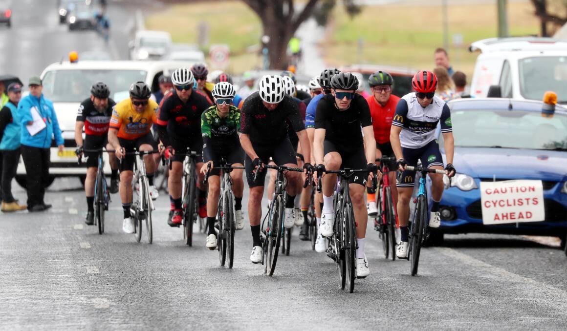 TOUGH GOING: Cyclists make their way through the early stages of last Sunday's John Woodman Memorial Cycling Classic. Picture: Les Smith