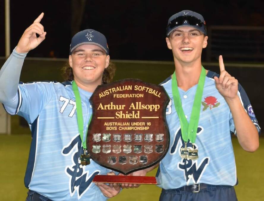 SUCCESS: Wagga softballers Braith Warren and Austin Gooden with the Arthur Allsopp Shield for winning the national under 16 championships in Blacktown. Picture: Carla Warren