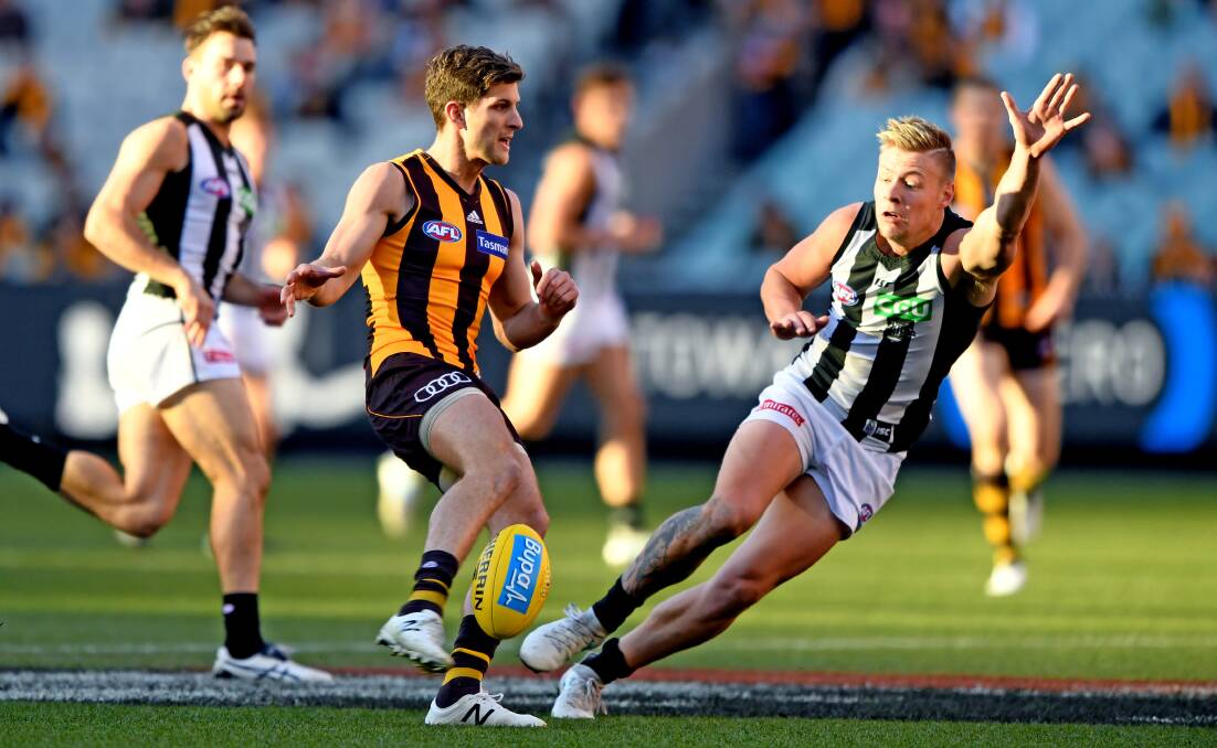 IMPRESSED: Hawthorn's Luke Breust in action against Collingwood. Breust has tipped a Magpies victory in this year's AFL grand final.