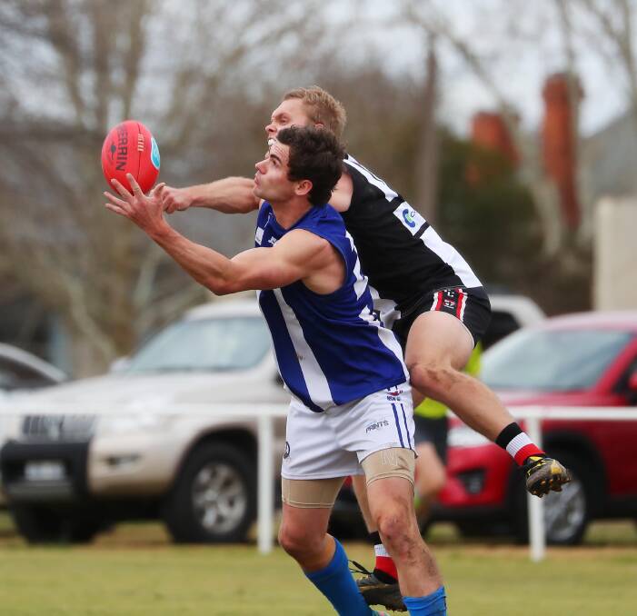 REMATCH AWAITS: Temora's Matt Wallis and North Wagga's Brayden Skeers tussle at McPherson Oval earlier this month. Picture: Emma Hillier