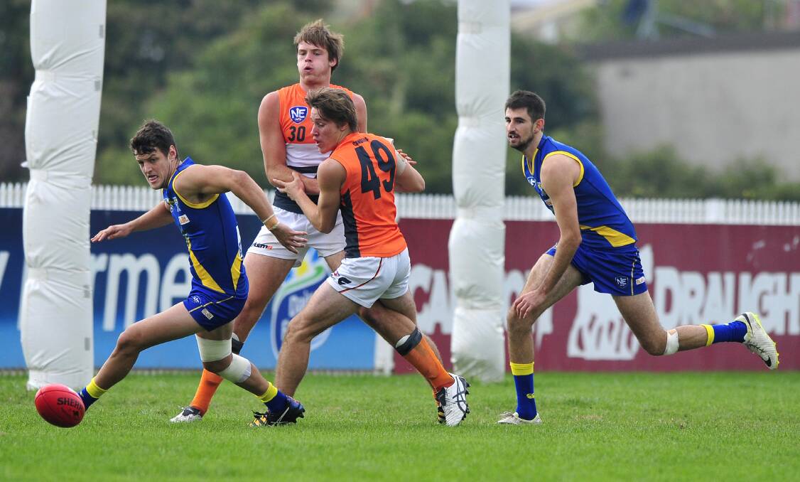 Nick Collins (left) in action for Canberra Demons.