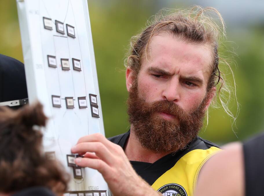 TRIBUNAL BOUND: Wagga Tigers coach Shaun Campbell addresses his team at a break in play against Charles Sturt University on Saturday. Picture: Kieren L Tilly