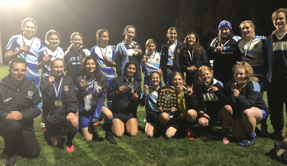 CHAMPIONS: Wagga High School's open girls soccer team celebrate their Shipard Shield win on Wednesday night. Picture: Matt Malone