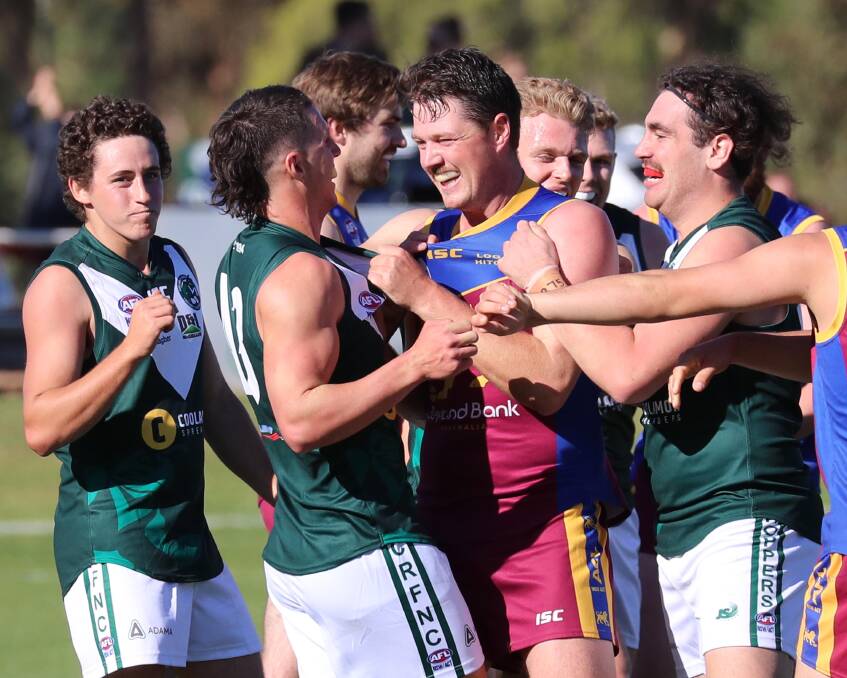 Coolamon's Jake Barrett gets some attention from a Ganmain-Grong Grong-Matong opponent in his first game for the Hoppers back in April. Picture: Les Smith