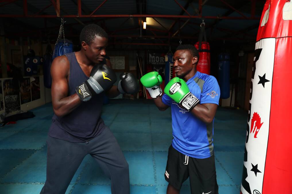 READY TO GO: Wagga boxers Regarn Simbwa and Bashir Nasir prepare for the National Golden Gloves tournament at Barefoot Boxing. Picture: Emma Hillier