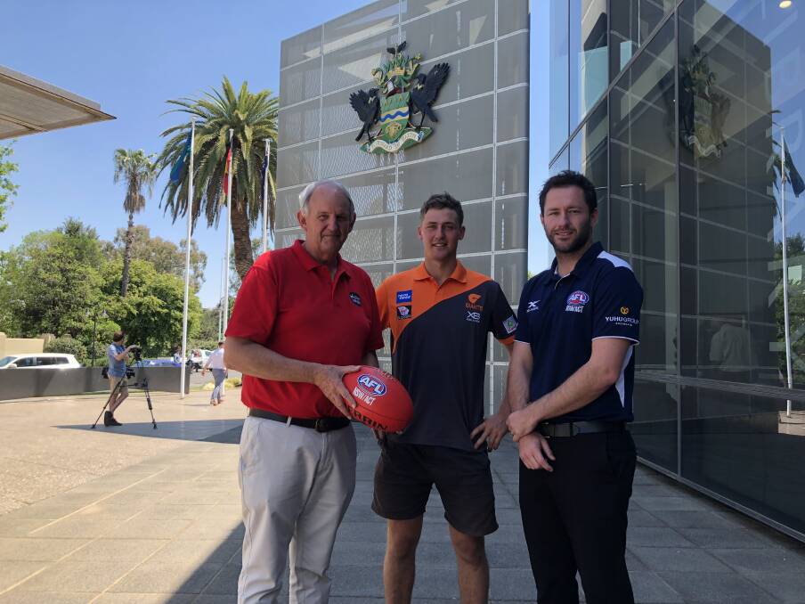 EXCITING TIMES: Wagga mayor Greg Conkey OAM, GWS footballer Harry Perryman and AFL Southern NSW game development manager Marc Geppert at Wagga City Council on Tuesday. Picture: Matt Malone