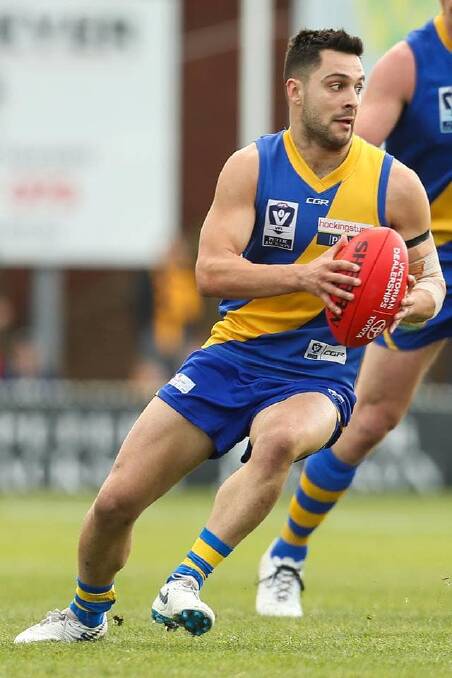 ABOUT TIME: Coolamon's Michael Gibbons in action for Williamstown. He has been given a chance to train with AFL club Carlton during the pre-season.