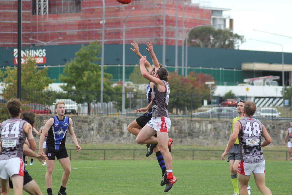 SOLID HIT-OUT: Collingullie-Glenfield Park ruckman Dusty Rogers goes up against his Gungahlin opponent in the trial game in Canberra on Saturday. Picture: Collingullie-Glenfield Park 