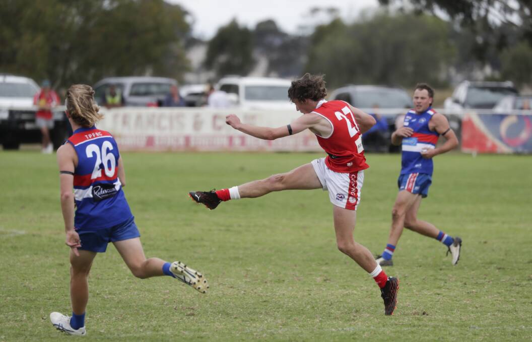 ON FIRE: Collingullie-Glenfield Park's Ed Perryman kicks one of his four opening-term goals against Turvey Park at Crossroads Oval on Saturday. Picture: Madeline Begley