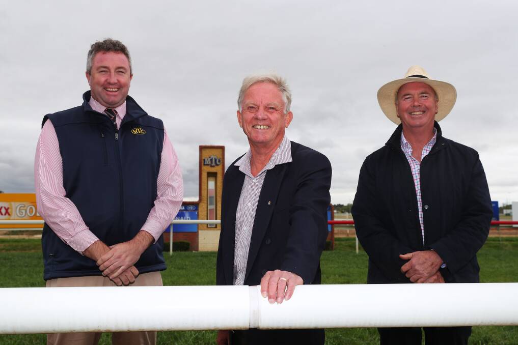 Allan Hull (middle) is flanked by Murrumbidgee Turf Club's Steve Keene (left) and Stuart Lamont (right) on Tuesday. Picture: Emma Hillier