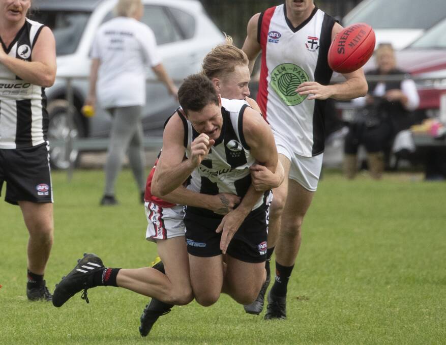 CRUNCH: North Wagga's Bailey Clark wraps The Rock-Yerong Creek's Aiden Ridley up with a strong tackle at Victoria Park on Saturday. Picture: Madeline Begley