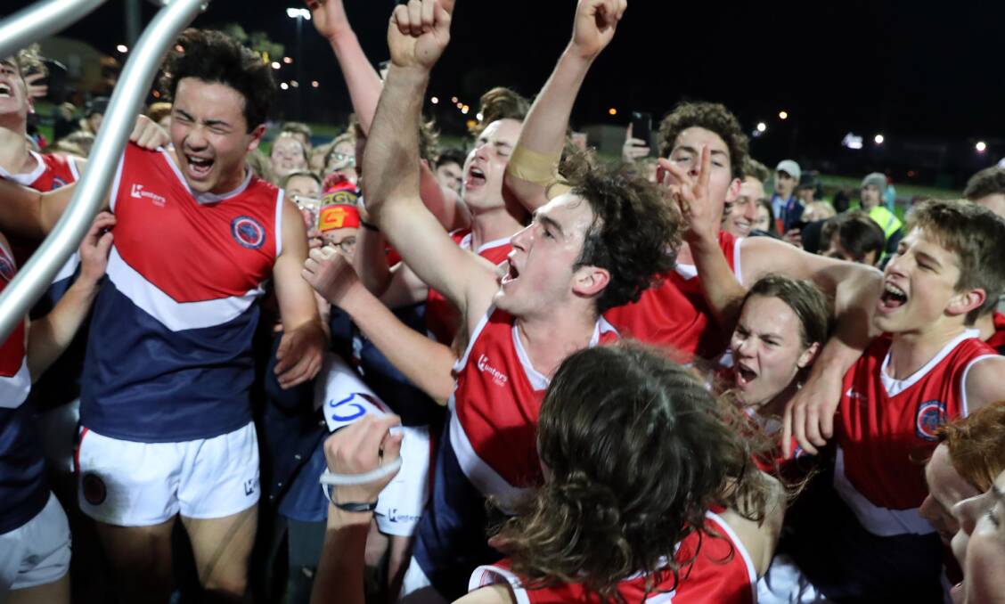 IN DOUBT: Kildare Catholic College celebrate its 2018 Carroll Cup final victory. It is one of a number of school sports competitions in doubt for this year. Picture: Les Smith