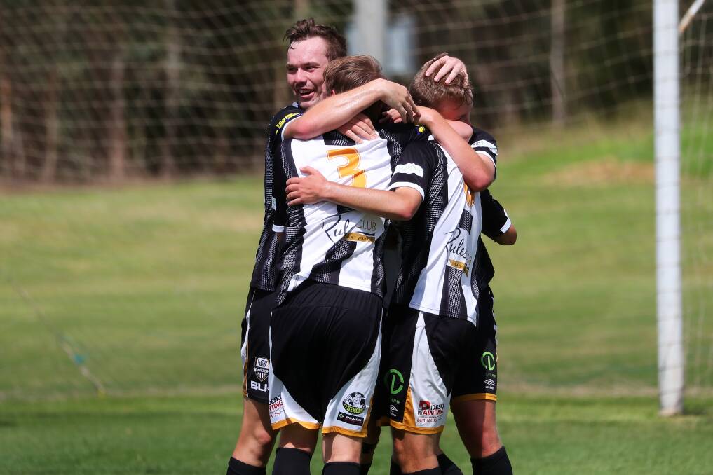 BACK AGAIN: Wagga City Wanderers celebrate a goal in an early FFA Cup game last March. The Wanderers will return to the field for the first time this Sunday for a trial game in Albury. 