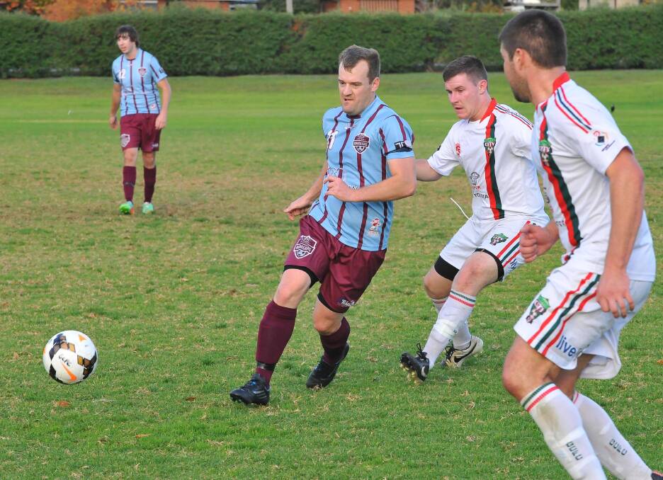 Justin Curran in action for Eastern Wanderers against Griffith City in 2014.