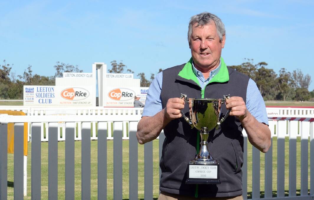 HAPPY DAYS: Gary Colvin with the Leeton Cup after Bravado Lass' win on Thursday. Picture: Kylie Shaw - Trackpix