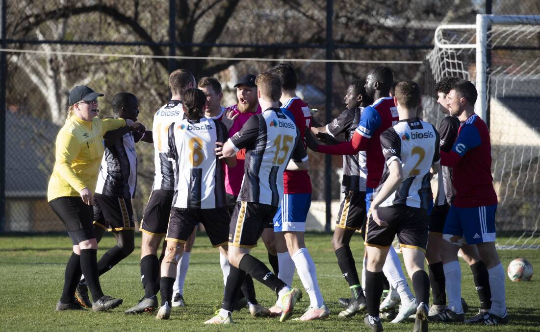 HEATED MOMENT: Tensions boiled over for a short period late in the game between Wagga City Wanderers and Canberra White Eagles at Gissing Oval on Saturday. Picture: Madeline Begley