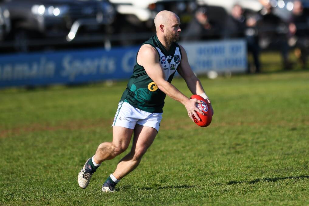 PLEASED: Coolamon co-coach Jamie Maddox sends his team into attack during the win over Ganmain-Grong Grong-Matong at Ganmain Sportsground on Saturday.