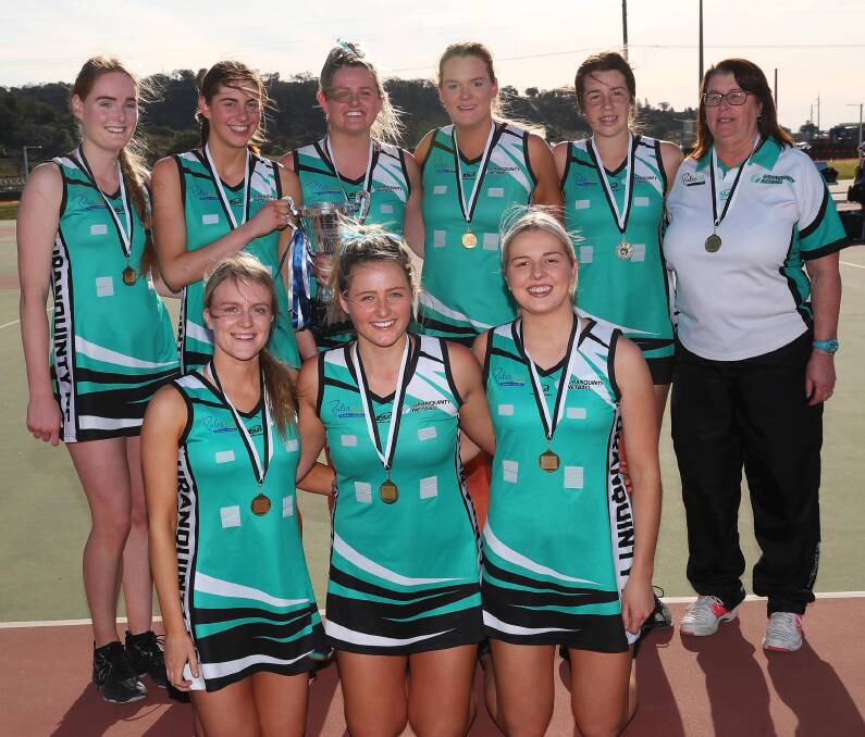 CHAMPIONS: Uranquinty celebrate their first Wagga Netball A grade premiership in six years at Wagga Netball Centre on Saturday. Pictures: Emma Hillier