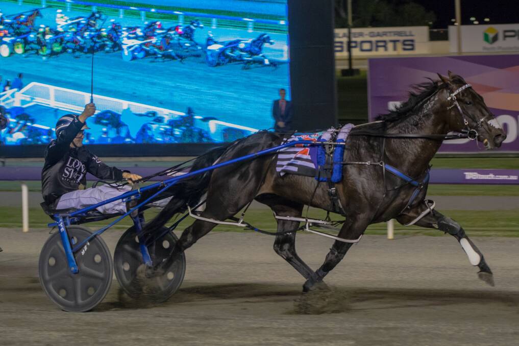 BIG COUP: Trainer-driver Mark Purdon salutes as Lazarus wins the Inter Dominion in Perth in 2017. He will stand at Yirribee Pacing Stud this season. Picture: Scott Hamilton Media