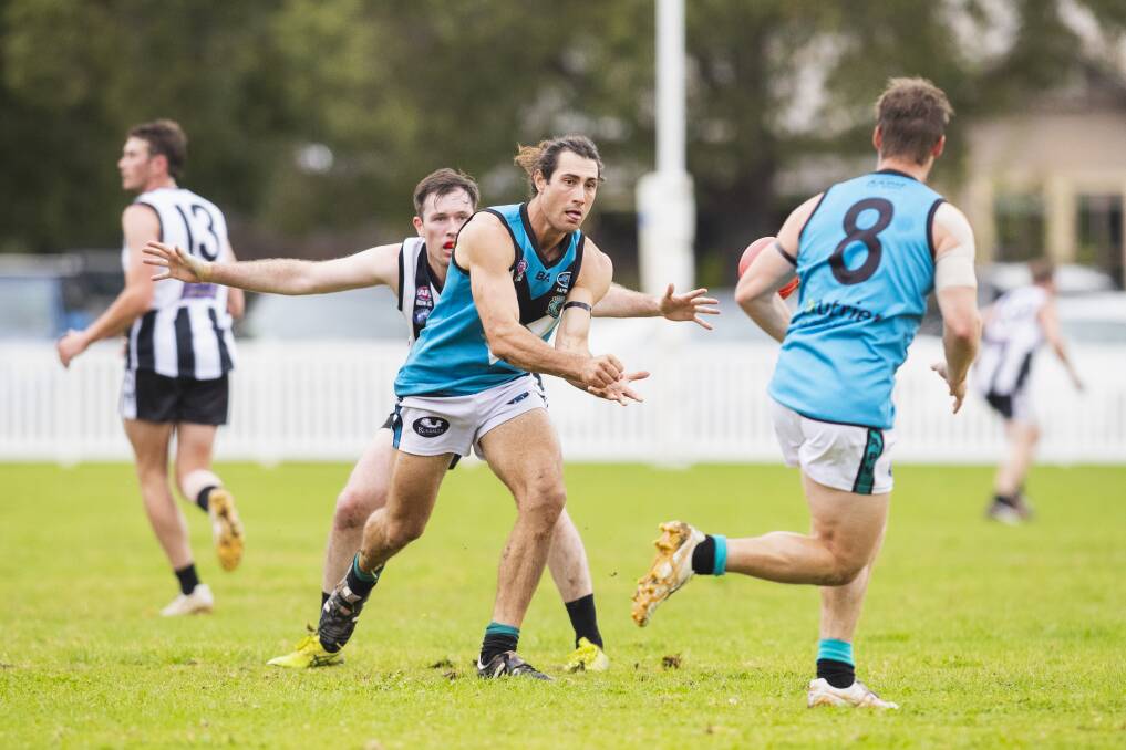 Mitch Haddrill dishes off a handball to Jack Harper against The Rock-Yerong Creek earlier in the season. Picture by Ash Smith
