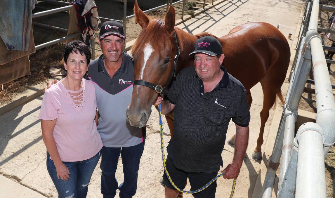 Maria Penfold, Scott Spackman and Noel Penfold with O' So Hazy earlier this year at her Wagga stable.