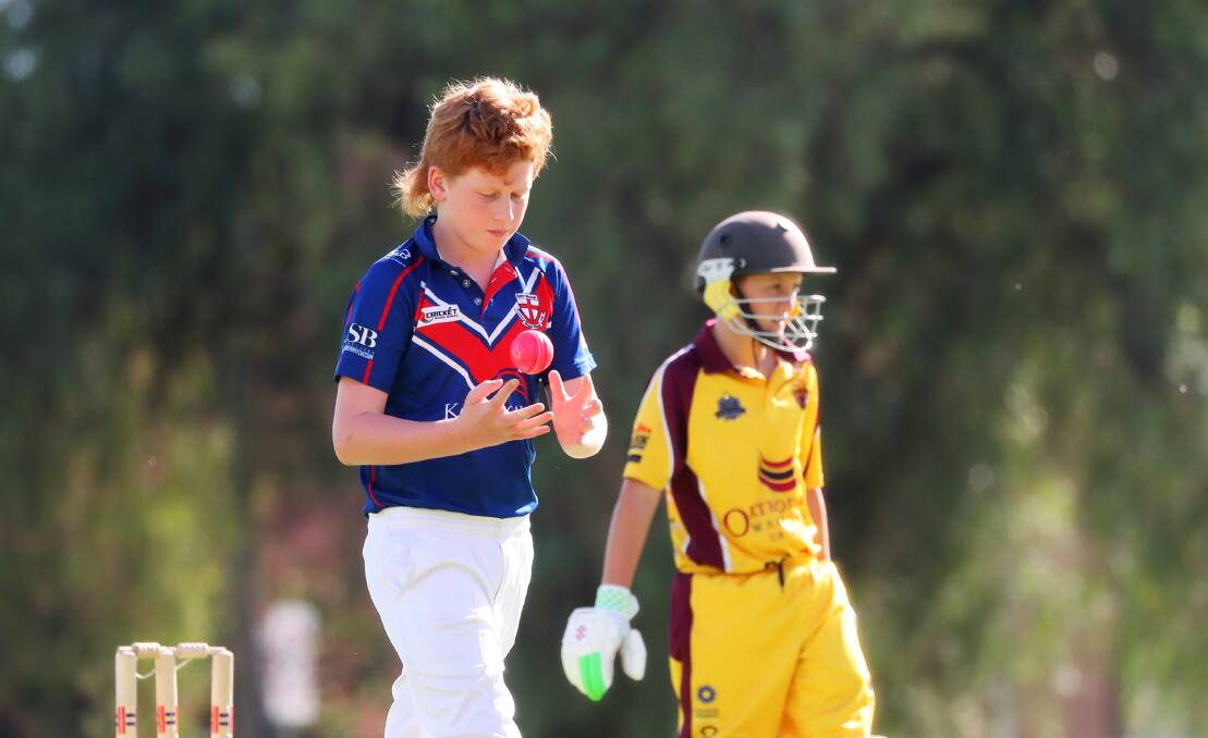 LONG WAIT: St Michaels' Jasper Ingold prepares for his next delivery in the under 12 grand final against Lake Albert Gold back in March. Picture: Emma Hillier