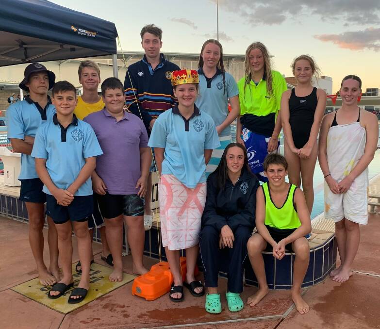 TOP PERFORMERS: The age champions from Mater Dei Catholic College's swimming carnival at Oasis Regional Aquatic Centre on Thursday night. 
