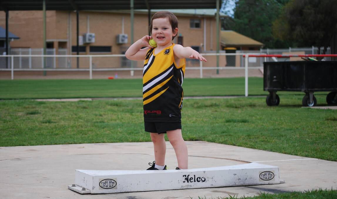 YOUNG GUN: Jace Wade has a crack at shotput at Wagga Little Athletics Club's 'Come and Try' afternoon at Jubilee Park last week. 