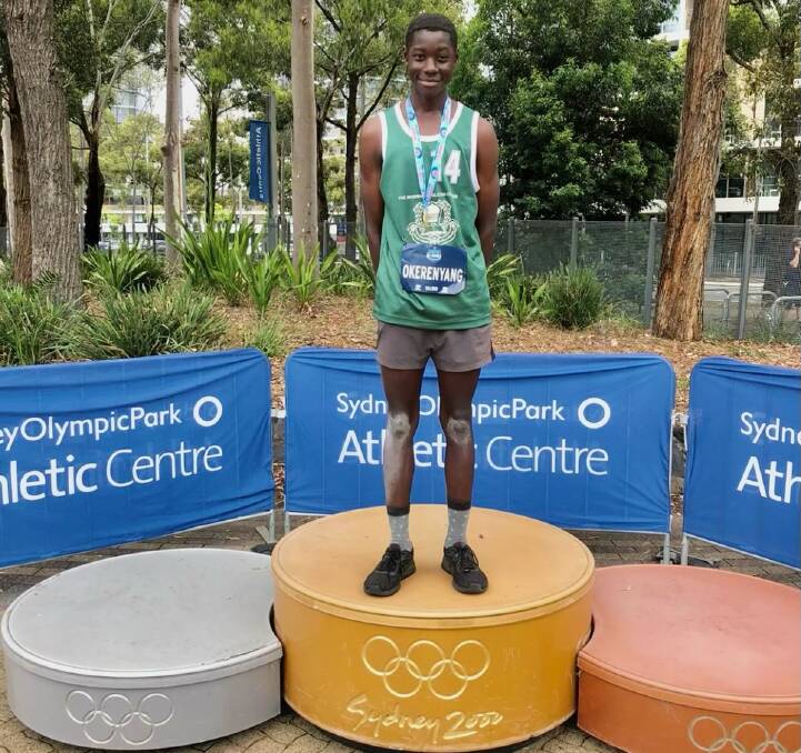 Daniel Okerenyang with one of his gold medals in Sydney.