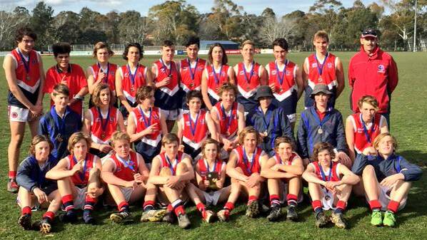 CHAMPIONS: Kildare Catholic College's under 15 team show off their medals after winning the Giants Cup in Canberra on Thursday.