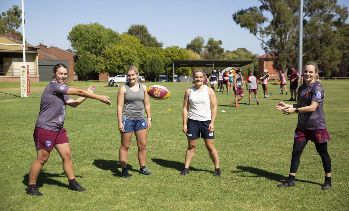 EXCITING TIMES: Group Nine board member Gabe Knight (third from left) with Riverina women's rugby league representatives Elise Smith, Milly Lucas and Sophie Gaynor at training on Saturday. Picture: Madeline Begley 