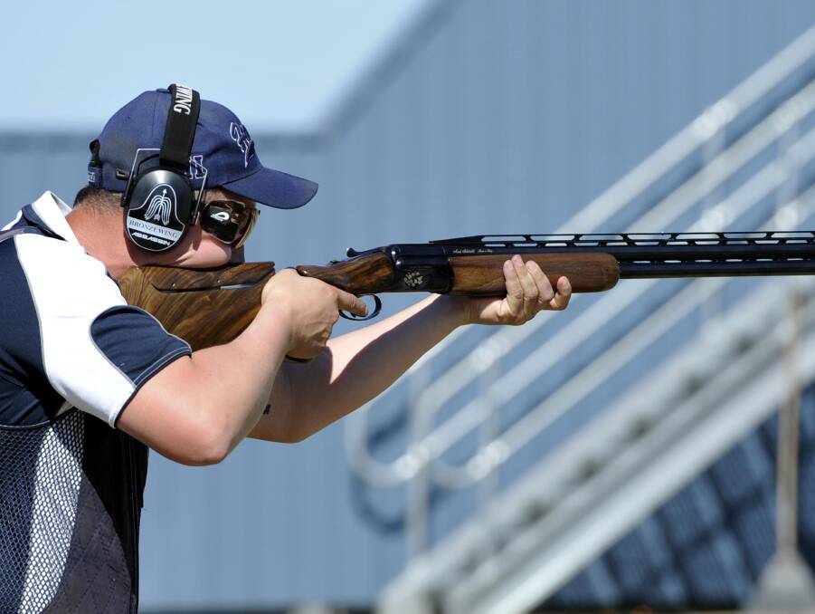 ON TARGET: Morwell's Andrew Brady eyes his target on Saturday in the state trap titles at Wagga's National Shooting Grounds.