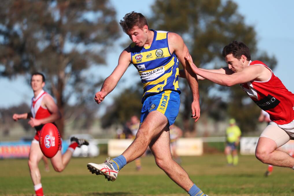 STRONG: Mangoplah-Cookardinia United-Eastlakes teenager George Kendall kicks the Goannas into attack during the win over Collingullie-Glenfield Park at Crossroads Oval on Saturday. Picture: Emma Hillier