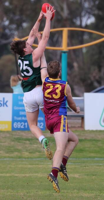 MAKE OR BREAK: Liam Delahunty takes a big mark for Coolamon in their last game of the season in 2018. Watch for him to be drafted this year. Picture: Les Smith