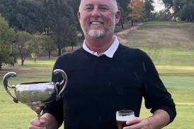 Wagga golfer Jarrod Meacham with the Riverina District Golf Association (RDGA) trophy after his win at Narrandera Golf Club on Sunday. Picture by RDGA