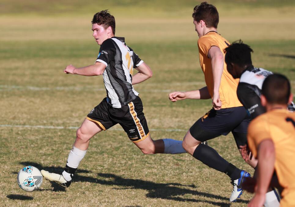 FOND MEMORIES: Luke Stevens in action for Wagga City Wanderers last season. Picture: Les Smith