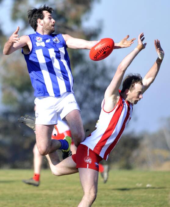 HIGH FLYER: Temora's Jack Irvine tries to reel in a mark in the Farrer League game against Charles Sturt University earlier in the season. Picture: Chelsea Sutton