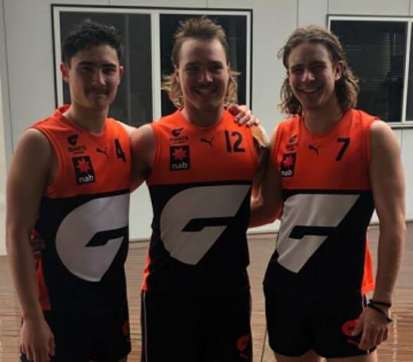 LION HEARTS: Ganmain-Grong Grong-Matong's young guns Tom Sase, Kai Watts and Matt Hamblin that played for the Giants Academy on Sunday. Picture: GGGM Lions